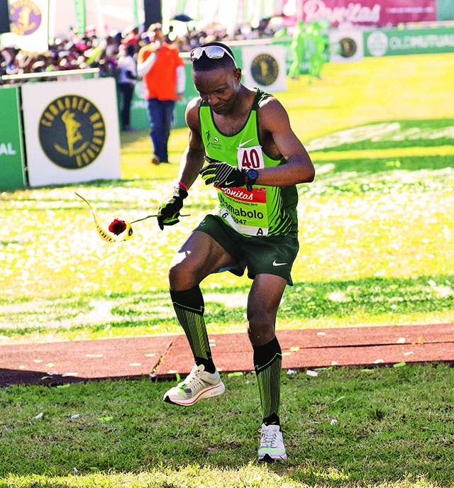 DURBAN, SOUTH AFRICA - JUNE 04:  Ludwick Mamabolo  during the Comrades Marathon 2017 on June 04, 2017 in Durban, South Africa. (Photo by Anesh Debiky/Gallo Images)